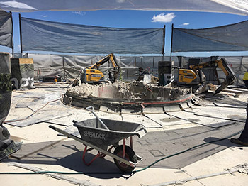 Demolition units cut away concrete 